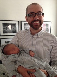 Mark in the middle of uncle-ing his 3-week old nephew.